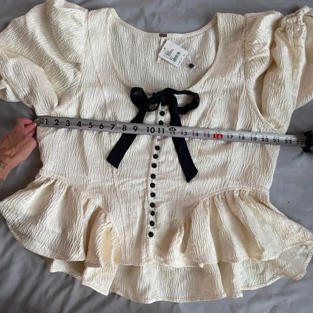 Free People NWT Cream Peplum Blouse Women's XL Textured Puff Sleeve Bow Top